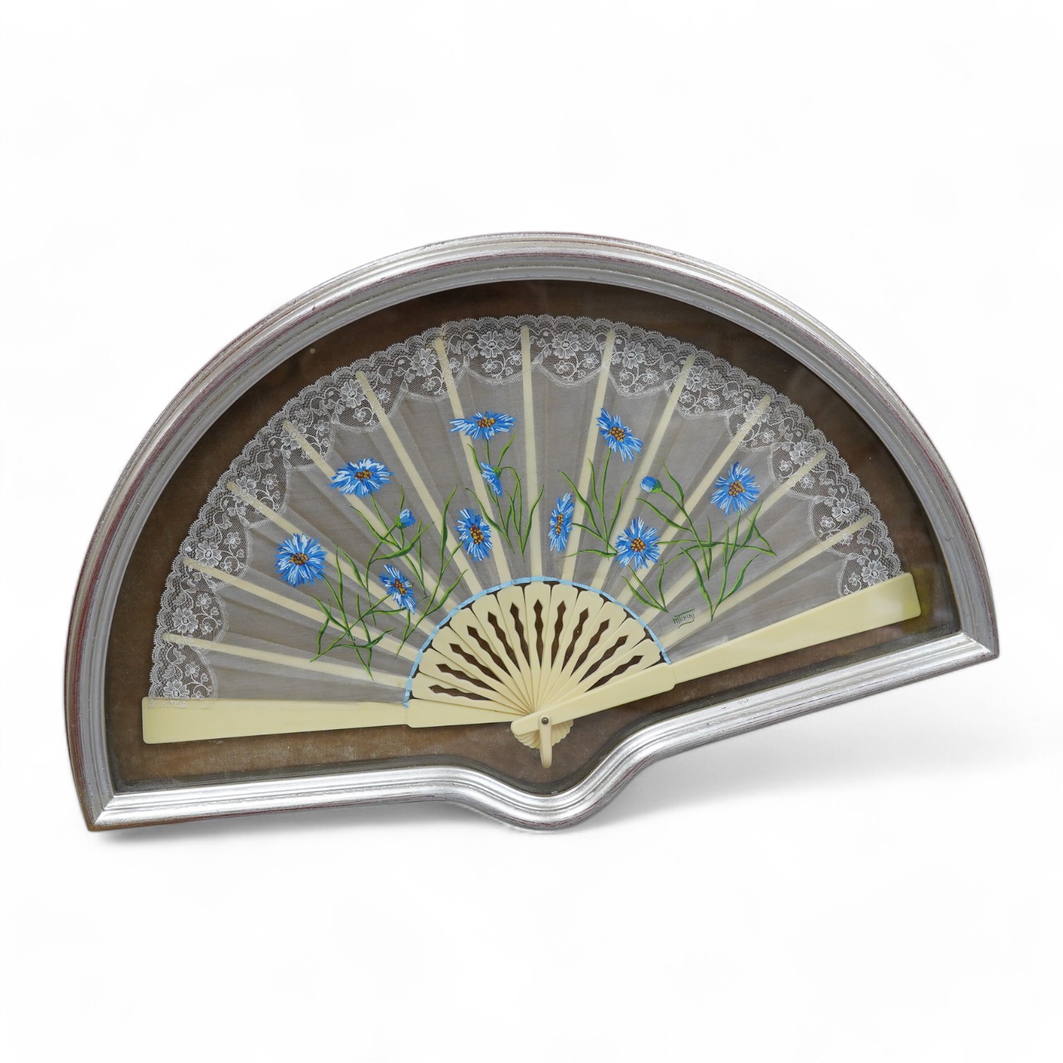 A 20th century silver painted fan case housing a hand painted floral and machine lace fan, case 40cm wide at base. Condition - fan good, case good